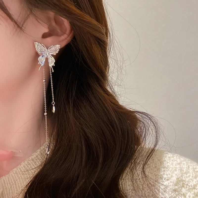 Diamond studded butterfly tassel earrings